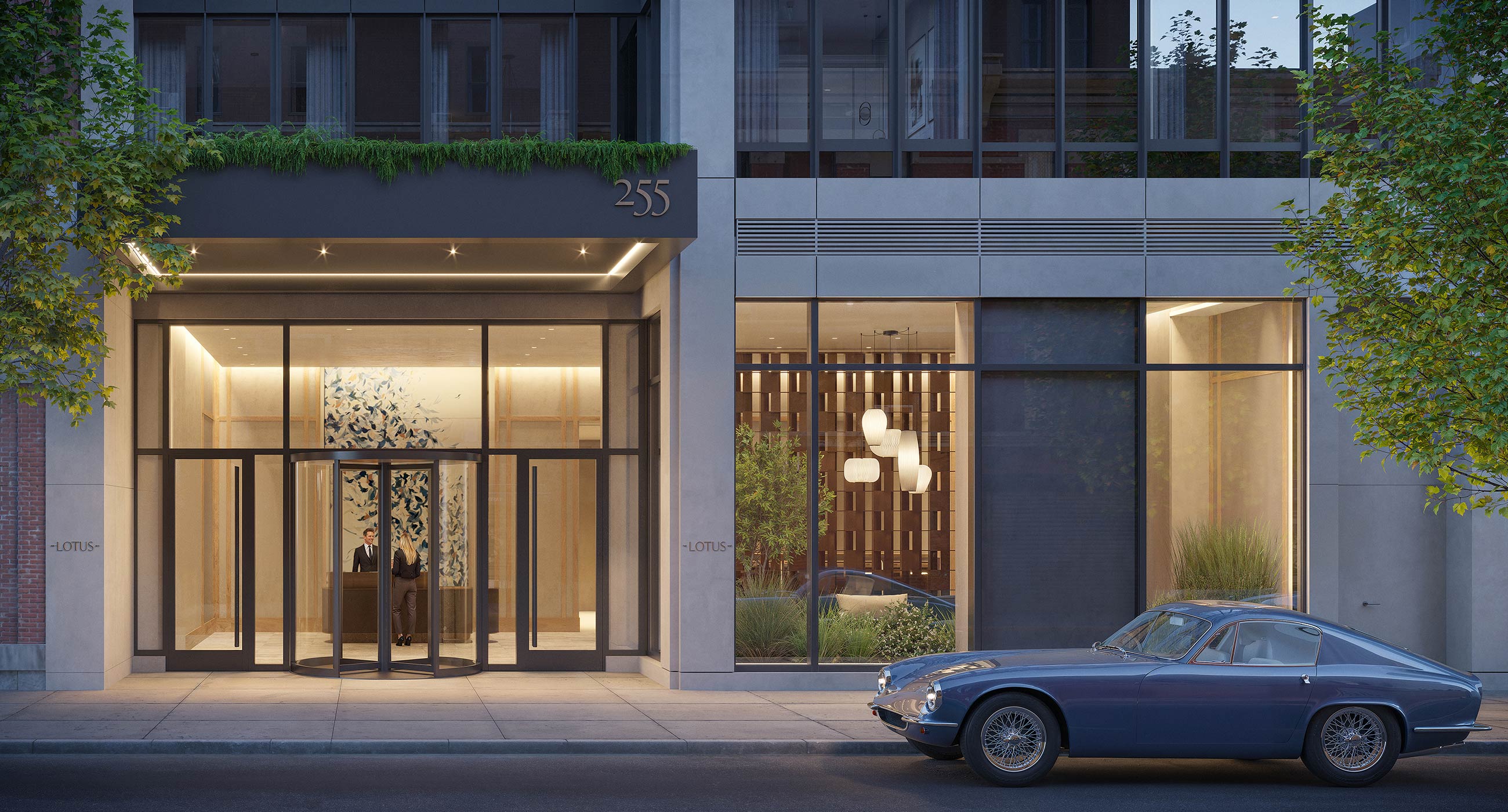 Exterior entrance of The Lotus NYC luxury apartment with cars at 255 East 39th Street in Murray Hill.