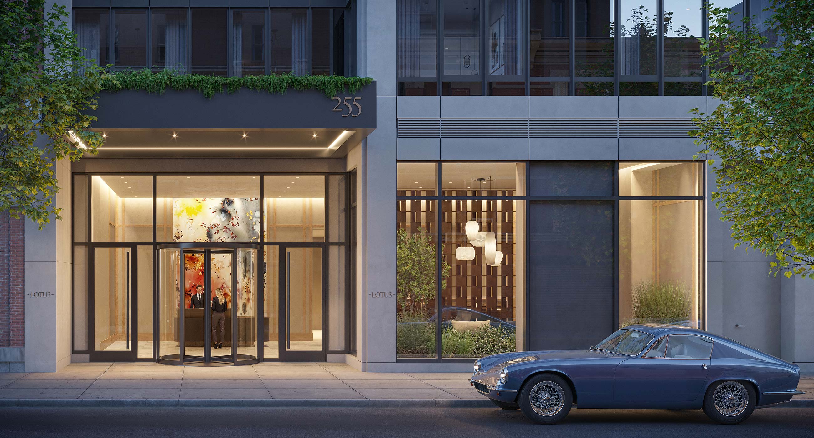 Exterior entrance of The Lotus NYC luxury apartment with cars at 255 East 39th Street in Murray Hill.